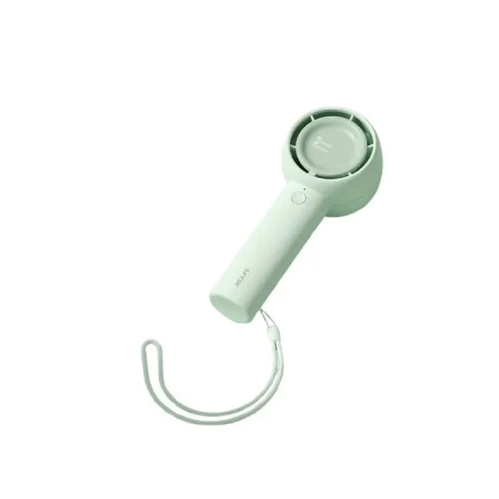 Angled lifestyle photo of the refreshing Mint Green JisuLife Handheld Fan Life5 4500mAh from XPRS Egypt.